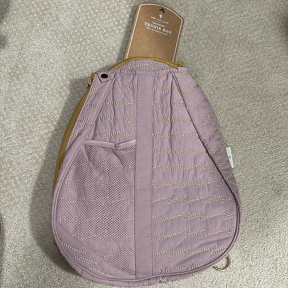 New with tags cross body Oak and Reed tennis bag.  Holds 2 rackets.